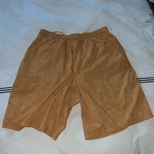 Orange Lululemon shorts medium.